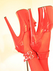 Sultry Babe Wearing Red Stockings Over Sheer - image nr. 9