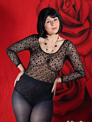 Leggy MILF Desyra teasing in dark blue - image nr. 1