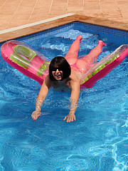 MILF Desyra dressed pink fishnet tights - image nr. 9