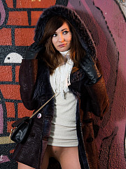 Jeny posing outdoors in furs and - image nr. 8