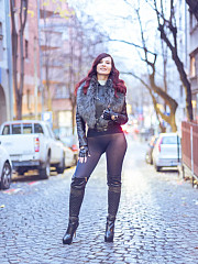 Jeny on a city street in tights - image nr. 10