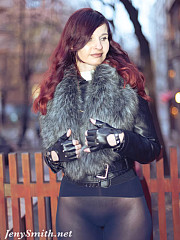 Jeny on a city street in tights - image nr. 8