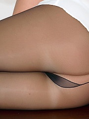 MILF Jess undresses to her sheer grey - image nr. 5