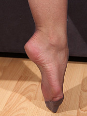 Girl In Sheer Brown Pantyhose - image nr. 2