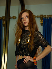 Redhead In Black Pantyhose Before The Mirror - image nr. 5