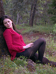 Amateur girl in black pantyhose comes - image nr. 1